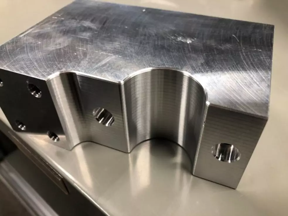 Burrless chamfering of fixturing jig