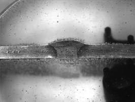 Hardness test impressions in an embedded butt weld